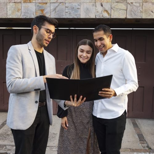 front-view-couple-talking-real-estate-agent